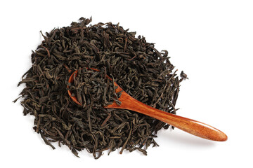 Dried black tea and a wooden spoon