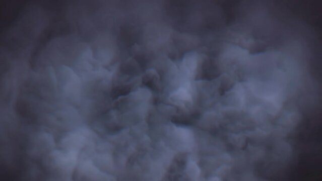 Abstract  smoke in slow motion. Smoke, Cloud of cold fog in light spot background. Light, white, fog, cloud, black background, 4k, ice smoke cloud. Floating fog.