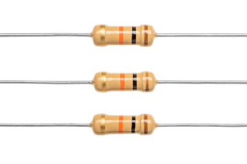 Carbon film resistors isolated. Macro shot of electronic components. Transparent PNG image.