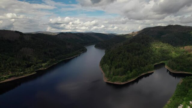 Aerial drone video of flight over the lake in Bad Lauterberg Germany.