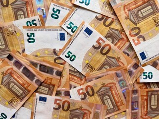 Euro currency banknotes background. European paper money backdrop with 50 euros bills.