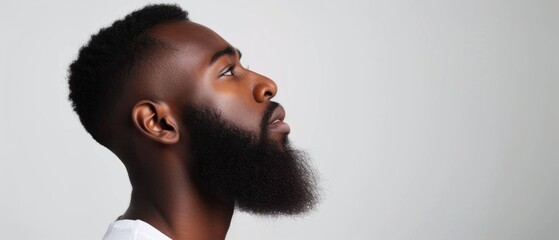 Closeup profile photo of macho attractive african american guy well groomed look empty space seriously isolated white color background - obrazy, fototapety, plakaty