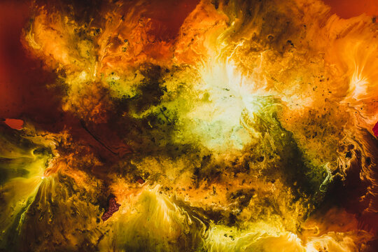Abstract fiery explosion of colors in art fluid painting