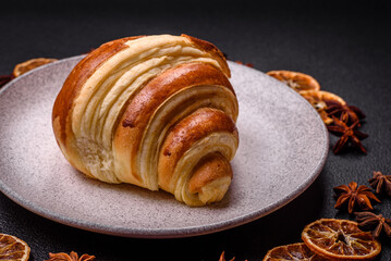 Delicious crispy sweet croissant cornet with chocolate