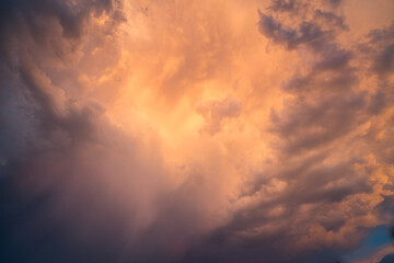 Dramatic sky with vibrant orange sunset clouds