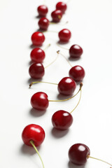 Ripe juicy cherry fruits on a white background