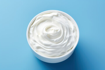 Whipped Cream Delight: A Heavenly Bowl of Fresh White Dairy Yogurt on a Natural Background