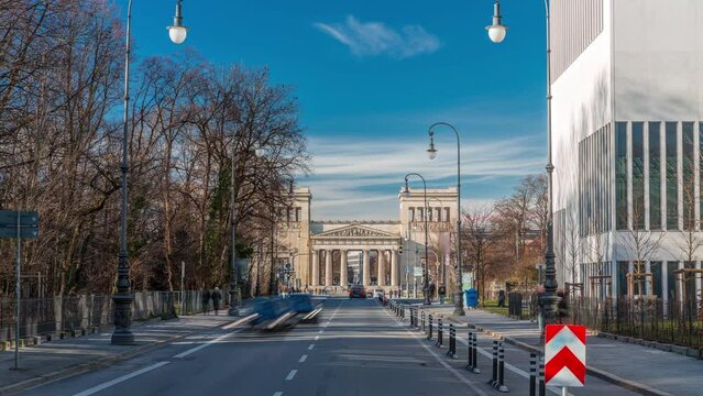Propylaea or Propylaen timelapse with traffic on Brienner street. Monumental city gate in Konigsplatz (King's Square), Munich, Germany, Europe. The building in Doric order, entrance for Acropolis
