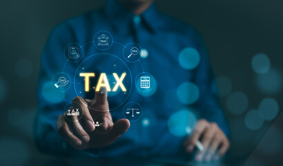 TAX concept. Businessman show TAX for individual income tax return form online for tax payment....