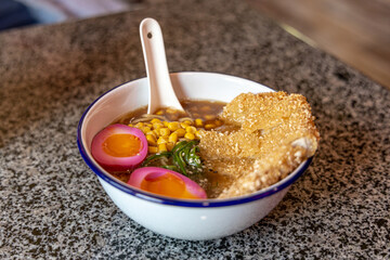 Japanese Sapporo ramen with pork bone broth.standard ramen seasoned with soy sauce.