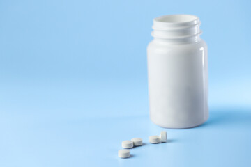 capsule, medicine tablet on a blue background