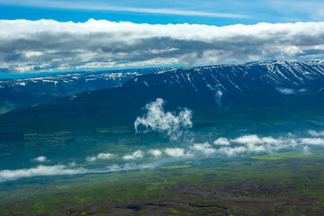 Aerial view of Iceland. Beautiful summer landscape with mountains and clouds