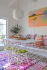 A light-filled dining space with modern furniture, colorful textiles, and a serene wall art of a waterfront