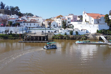 Aerial view of the small ferry boat that crosses from Spain to Portugal and vice versa trough...
