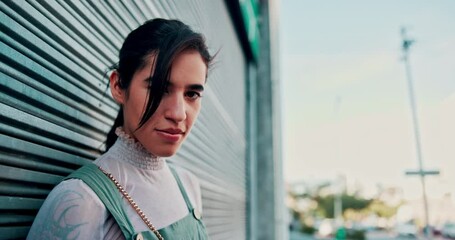 Travel, face and woman in a city street for career opportunity, experience or goals on garage background. Urban, portrait and ambitious female fashion student in New York for immigration or new start