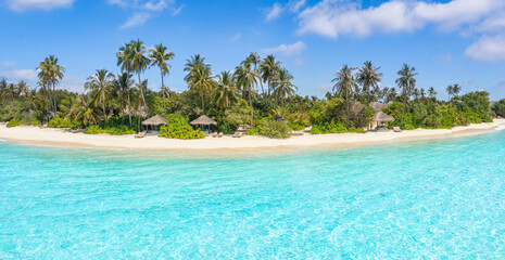Aerial Maldives landscape view tropical summer palm trees sandy coast ocean waves splash crash. Beautiful sunny sea exotic resort amazing nature landscape. Drone view of tourism beach villas bungalows