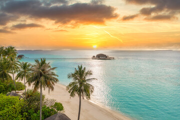 Picturesque aerial landscape luxury tropical island resort water villas. Beautiful island beach...