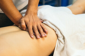 Fototapeta na wymiar Physiotherapy Clinic: Back Recovery Massage