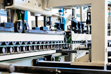 A industrial commercial envelope making machine, making paper envelopes for international...