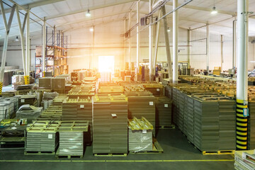 Big warehouse with paper rolls and printing material