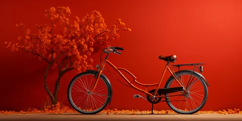 Rolgordijnen Bicycle next to a red wall, red tone © Rassamee