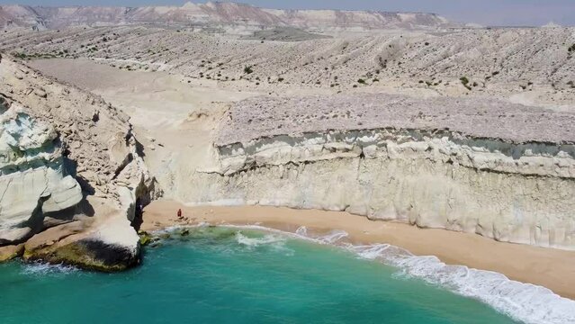 Green color gulf harbor coastal sea sand beach in tropical desert climate Hormus Island wonderful nature natural landscape in Iran Oman Qatar Doha Saudi arabia local people traditional culture