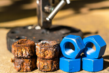 Corrosion on old threaded nuts used in the petroleum industry.