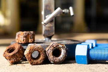 Corrosion on old threaded nuts used in the petroleum industry.