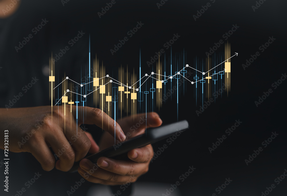 Aufkleber hand of businessman or trader is showing a growing virtual hologram stock on smartphone, planning an