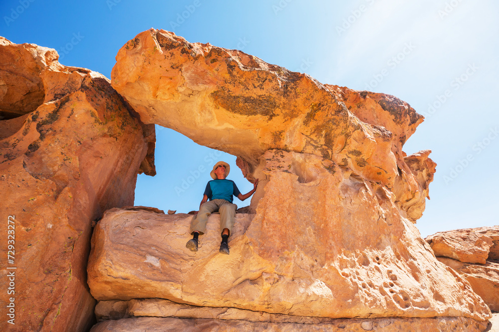 Wall mural Man on the cliff