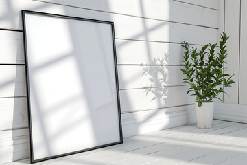 thin a3 sized frame mockup leaning against a white wooden wall, reflections of windows, tilted side view