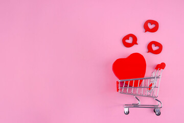 Valentine day sale with shopping cart gift box and heart decor