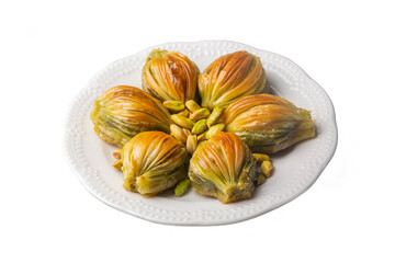 Turkish Midye Baklava ( Mussel Shape Baklava ) with green pistachio Powder and Butter Cream. Conceptual of Islamic Feasts.