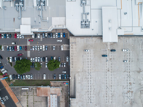 Car park beside shopping center in town