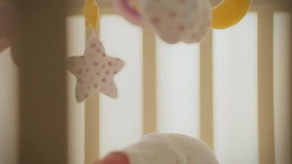 Soft toys that circle above the crib play an important role in creating a cozy atmosphere for the baby. They help him relax and fall asleep easily. A playmobile for children rotates above the crib