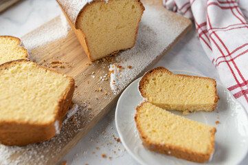 Fototapeta na wymiar German loaf of spong cake. Traditional sand cake or sandkuchen