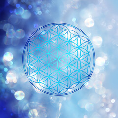 Symbol einer Blume des Lebens in einem blau funkelden Feld kosmischen abstrakten Lichts