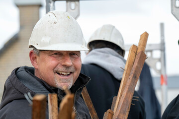 Portrait of experienced tradesman with hard hat
