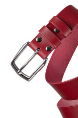 Part of a leather belt with a metal buckle close-up isolated on a white background.