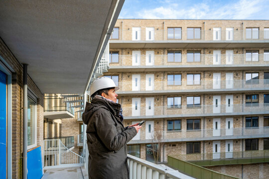 Female Construction manager walking around site