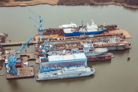 Aerial image of industrial ships in dry dock being repaired. Bremerhaven, Germany