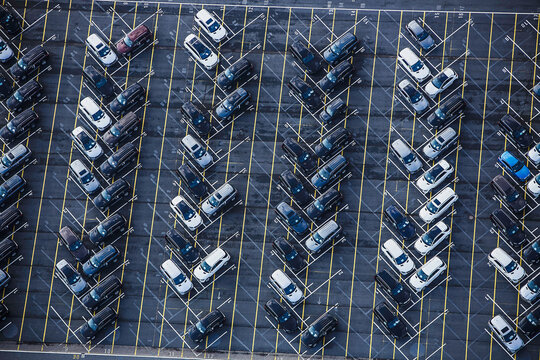 large parking lot full of cars to be shipped