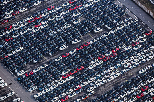 large parking lot full of cars to be shipped