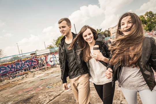 Group of friends hanging out together in an urban area. Munich, Germany