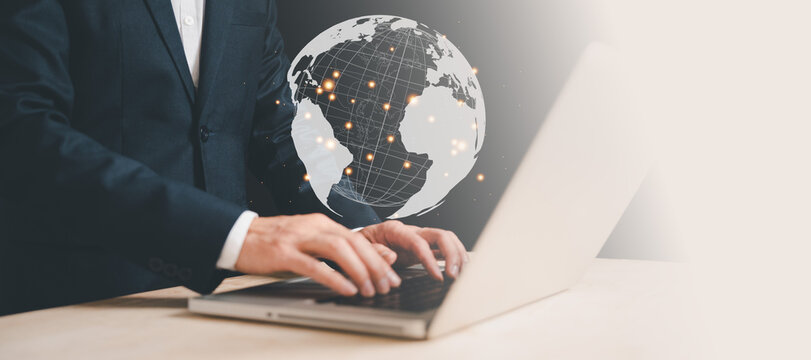 Businessman in connections worldwide networks concept for logistic, export, import, delivery, map, travel communication and international business technology by internet online in network globe icon