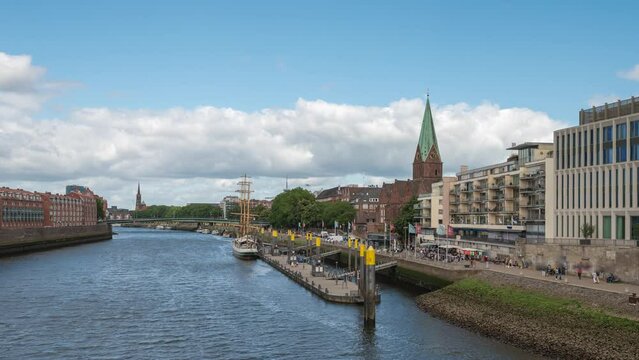 Bremen Germany time lapse, city skyline at Weser River with Martinianleger Pier