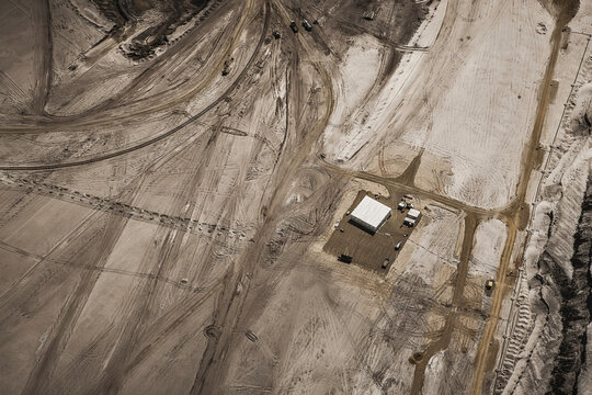 Aerial landscape of coal strip mine and large mining equipment. Welzow, Germany