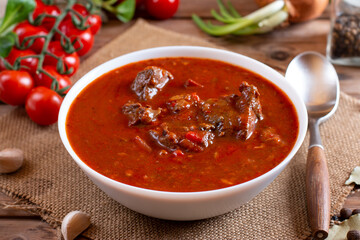 Goulash or Gulasch is a soup or stew of meat and vegetables seasoned with paprika and other spices. Perfect for recipe, article, menu book, or any cooking contents.