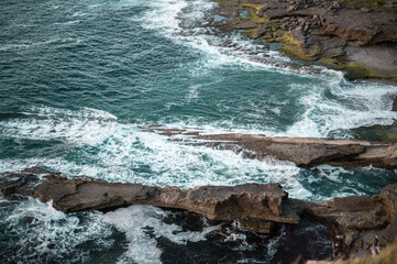 waves crashing on rocks
