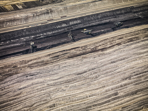 Aerial landscape of coal strip mine and large mining equipment. Welzow, Germany